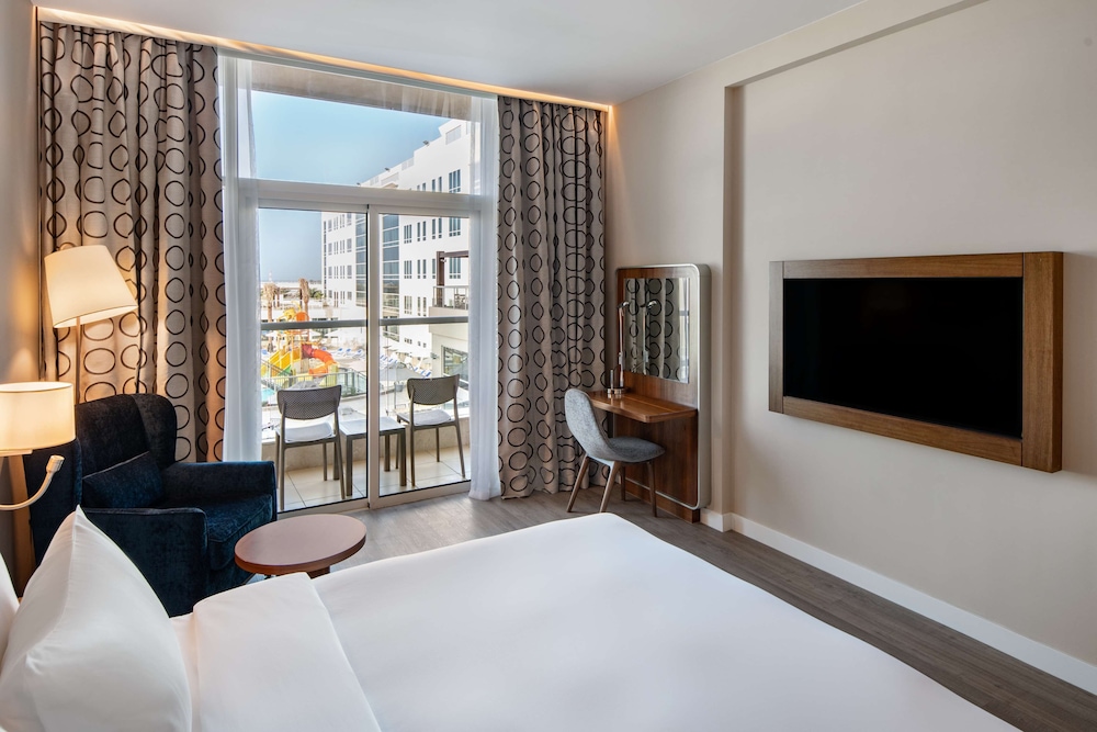 Hôtel Radisson Resort Ras Al Khaimah Marjan Island 4*, Séjour Emirats Arabes Unis, Dubaï par Ôvoyages Hôtel Radisson Resort Ras Al Khaimah Marjan Island 4*, Séjour Emirats Arabes Unis, Dubaï par Ôvoyages